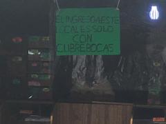 Cartel y medidas de prevención en depósito de semillas, Colonia Portales, CdMx. Fotografía: Camila Danae Arana Flores