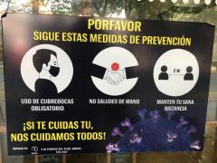 Cartel Por favor sigue estas medidas de prevención, Manduca Pan Deli, Av. Nuevo León 125-D, Colonia Hipódromo, CdMx. Fotografía: Gloria Elisa Melgarejo García.