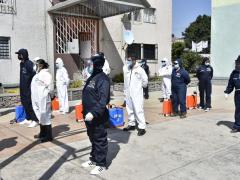 Integrantes de la brigada de sanitización de Iztapalapa.