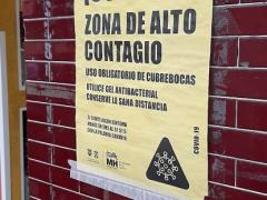 Anuncio ¡Cuidado! Zona de alto contagio, cercanías del Mercado de Garda. Fotografía: David Alonso Vargas Melgarejo.