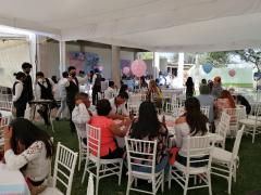 Festejo en donde los meseros usan cubrebocas, Cerrito del Jaral, Mexquitic de Carmona, SLP. Fotografía: Ariel Antonio Flores Ramirez.