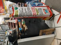 Lona Realiza tu compra segura, "OXXO", Soledad de Graciano Sánchez, SLP. Fotografía: Flor Mariela Hernández Mendoza.