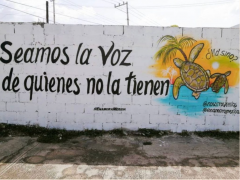 Mural "Seamos la voz de quienes no la tienen ¿ma´sino?", elaborado por Enamora Mérida y miembros de la comunidad.